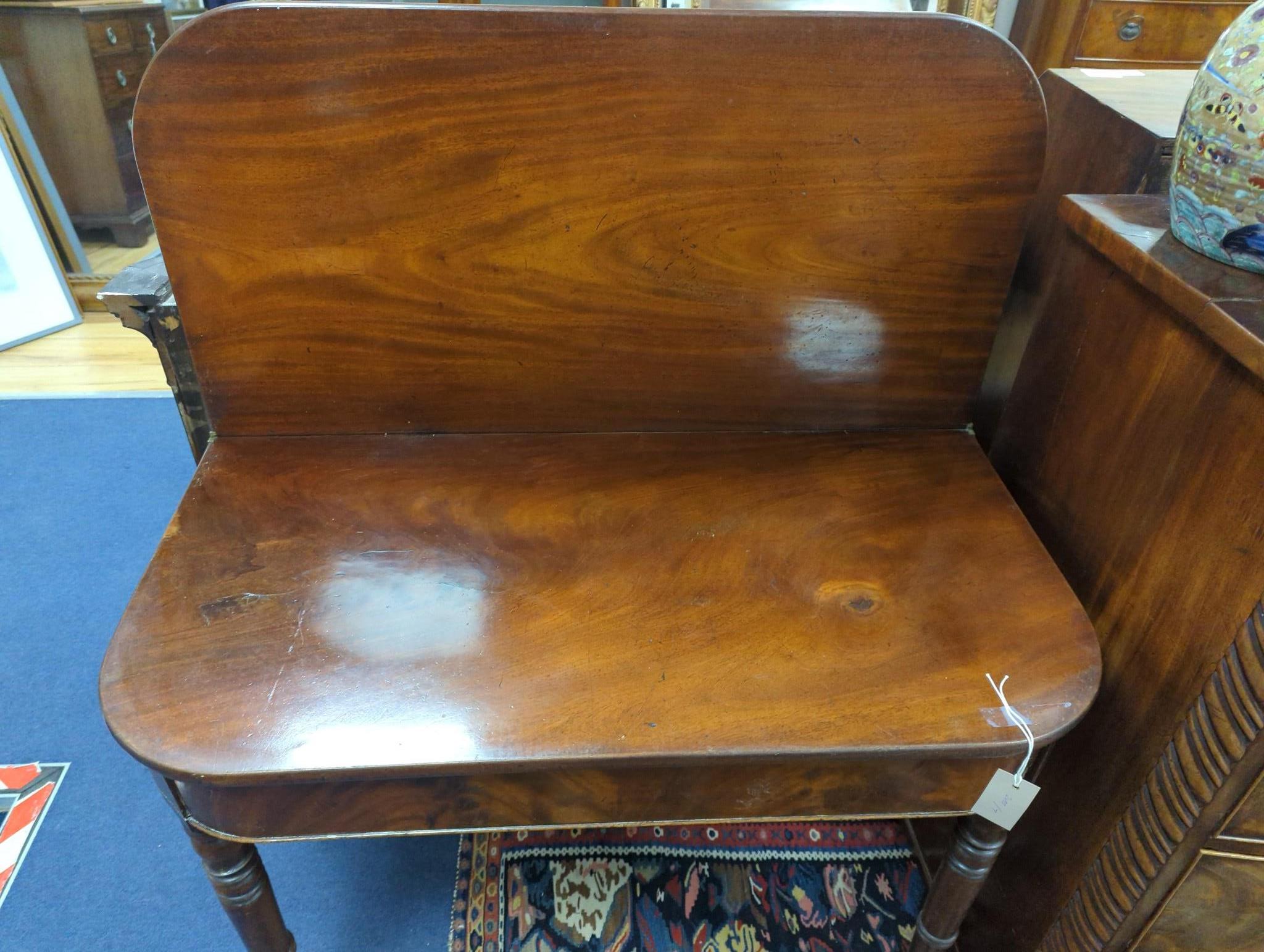 A Regency mahogany D shaped folding tea table, width 91cm, depth 46cm, height 74cm